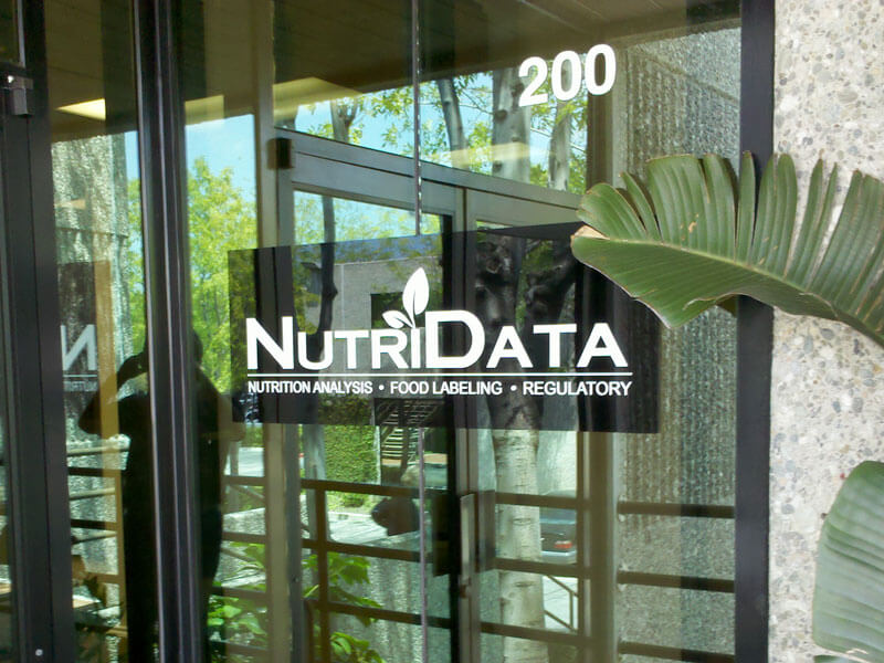 NutriData sign hanging on window of front entrance